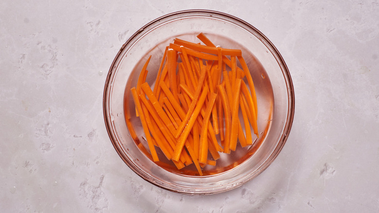 chopped carrots in white vinegar