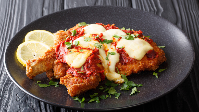 steak milanesa covered in cheese