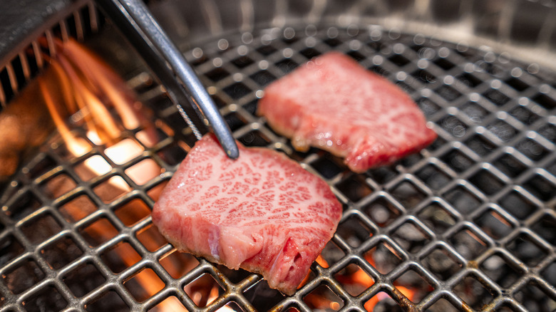 Cooking Wagyu steak on grill