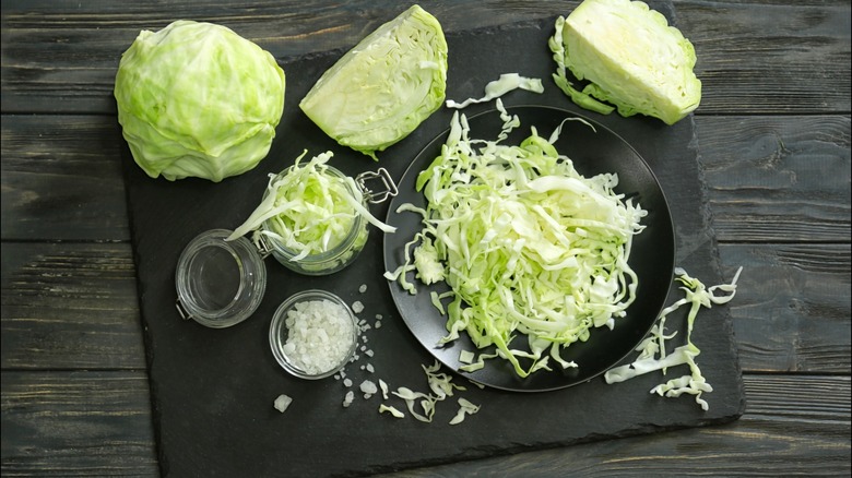 cut cabbage on wooden table