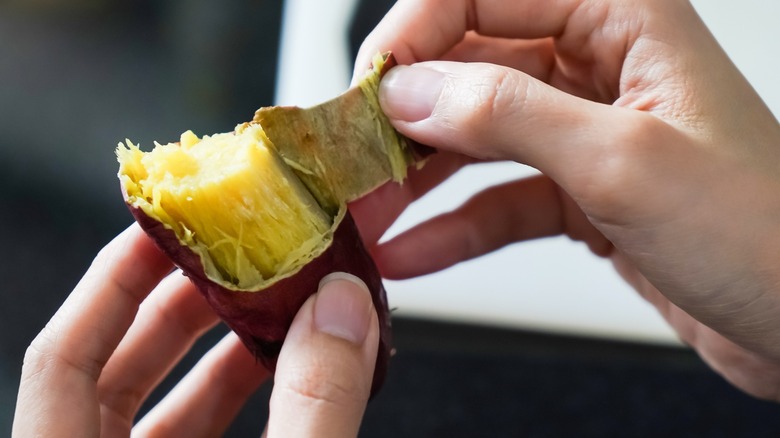 peeling cooked sweet potato