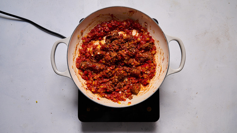 chorizo tomato mixture in pot