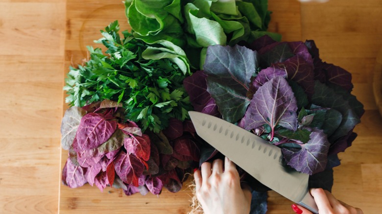 kale greens knife cutting board