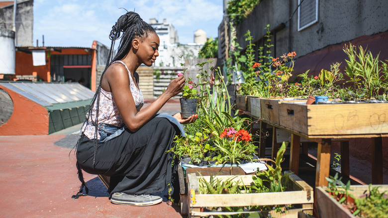 Woman working in urban garden