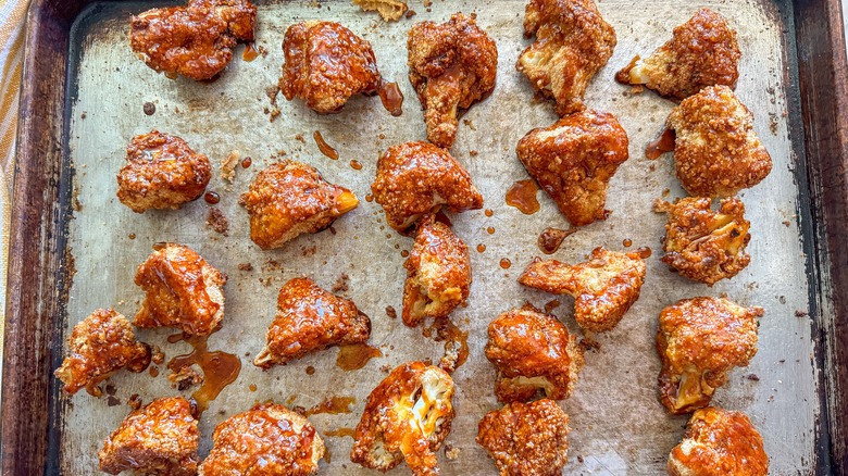 cooked cauliflower on baking sheet