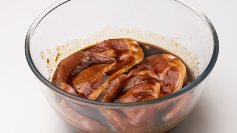 Marinading pork steaks 