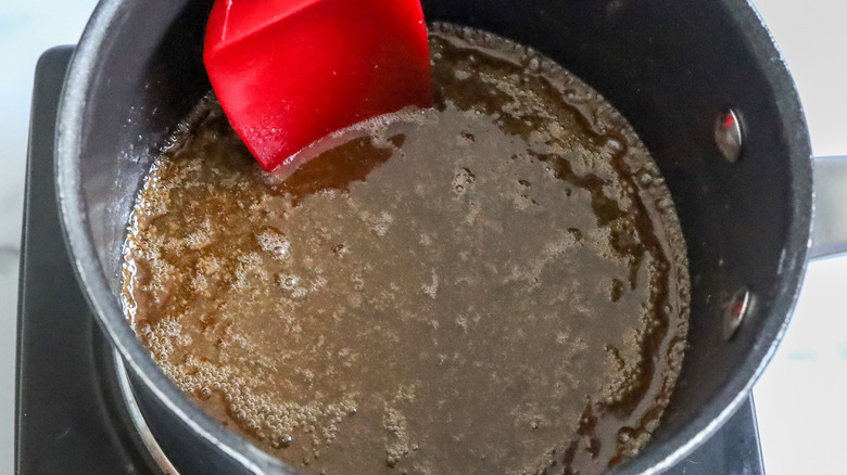 brown liquid in pan