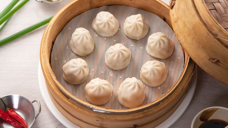  soup dumplings in a steamer