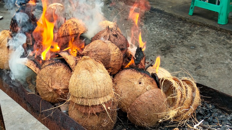 Burning coconut shells