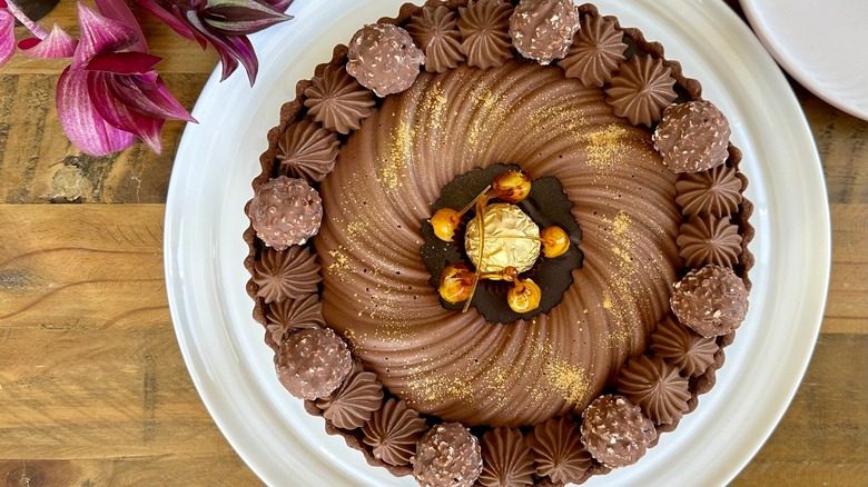 cake decorated with chocolate truffles