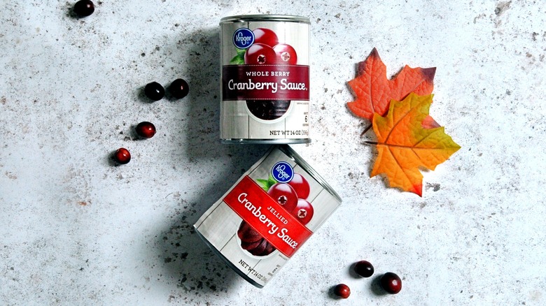 Cans of Kroger cranberry sauce