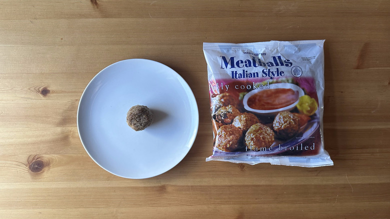 Trader Joe's meatballs bag and meatball on white plate