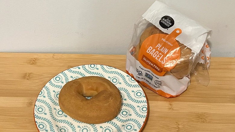 Little Northern Bakehouse plain bagel on a plate with the package