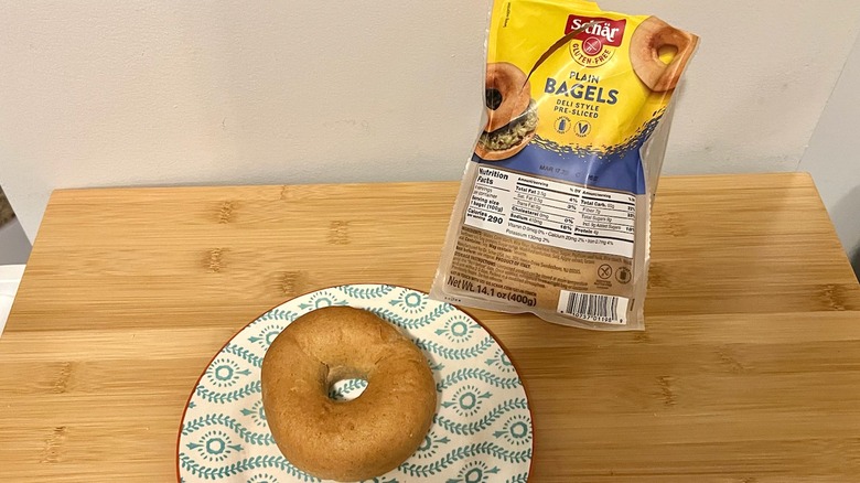 Schär plain bagel on a plate with the package