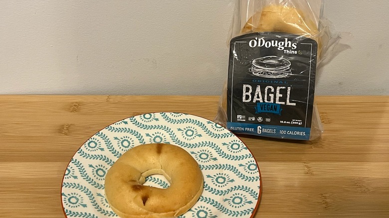 O'Doughs bagel thin on a plate with the package