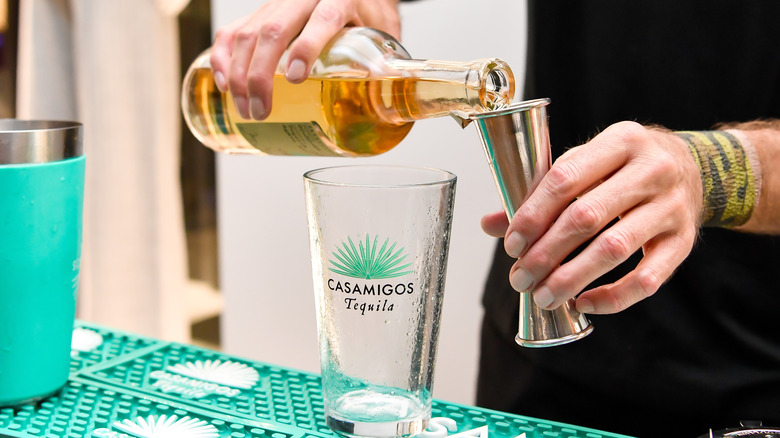 Bartender pouring Casamigos tequila