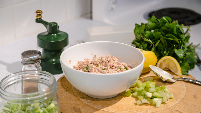 Ingredients for tuna salad on counter