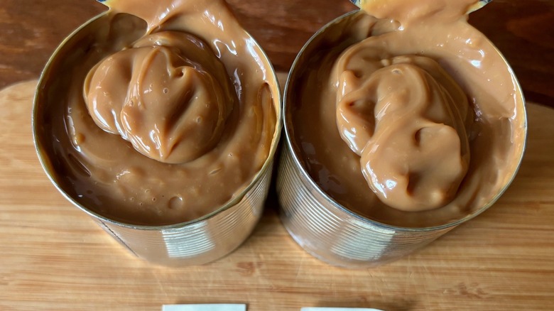 Two cans dulce de leche