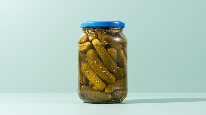 A clear jar of pickles