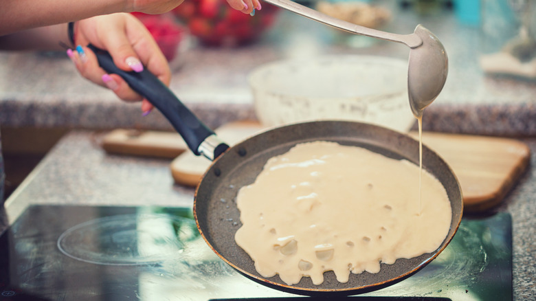 Crepe batter being poured