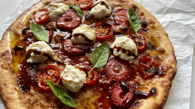 close up strawberry tomato pizza