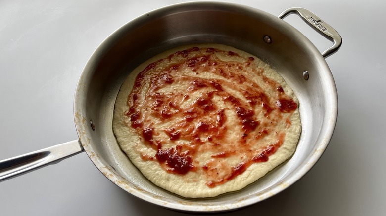 strawberry jam on pizza dough