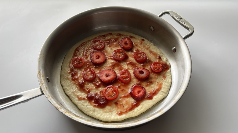 uncooked strawberry and tomato pizza