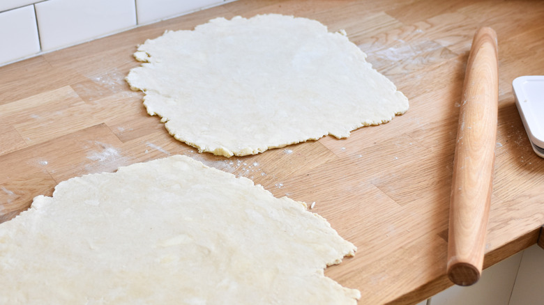 rolling out pie dough