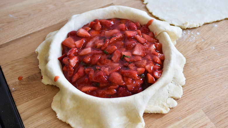 adding filling to pie 