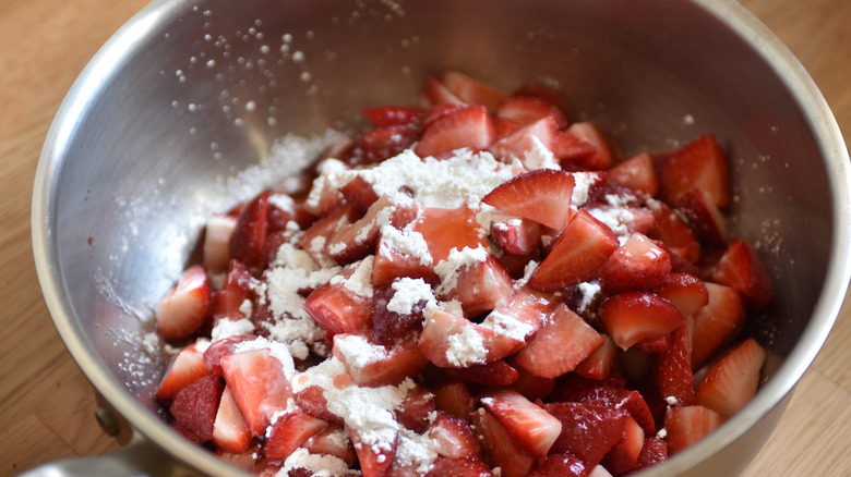 preparing strawberry pie filling