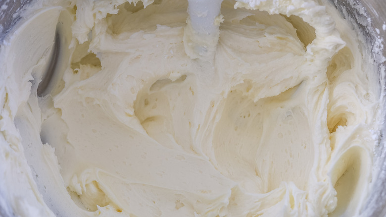 Coconut frosting in a stand mixer bowl