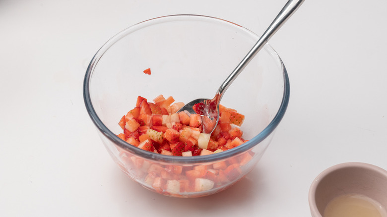 strawberries in elderflower cordial in bowl