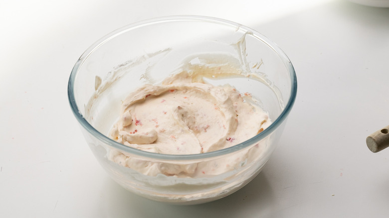 strawberry yogurt fruit fool mixture in mixing bowl