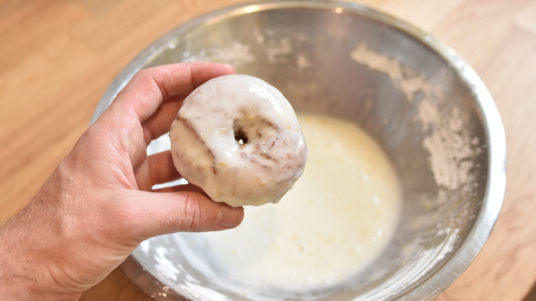 dipping donuts in glaze