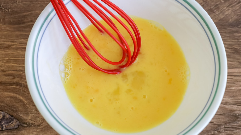 whisked egg wash in a bowl