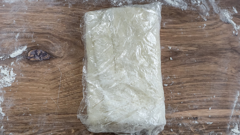 plastic wrapped folded turnover dough