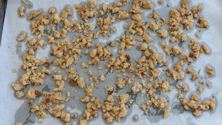 baked crumb topping on a baking sheet