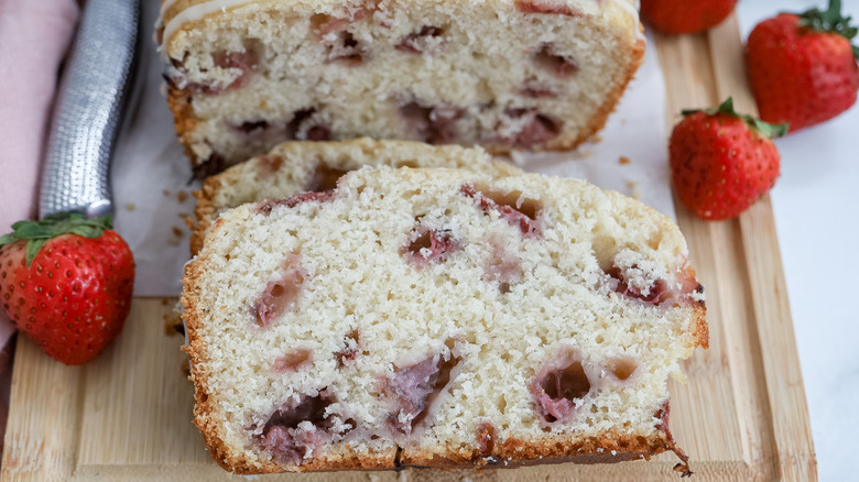 sliced strawberry bread on board