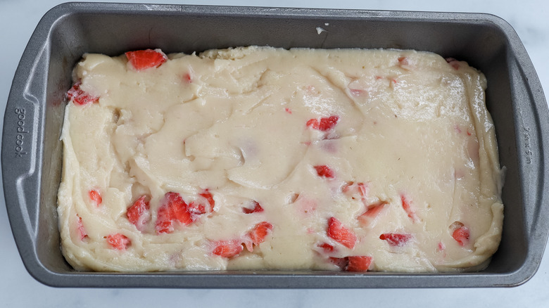 strawberry bread batter in pan