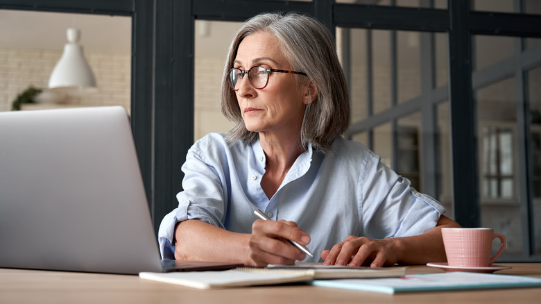 Person using computer at home