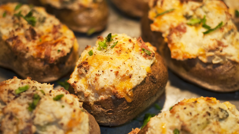 Twice baked potatoes with tuna and cheese