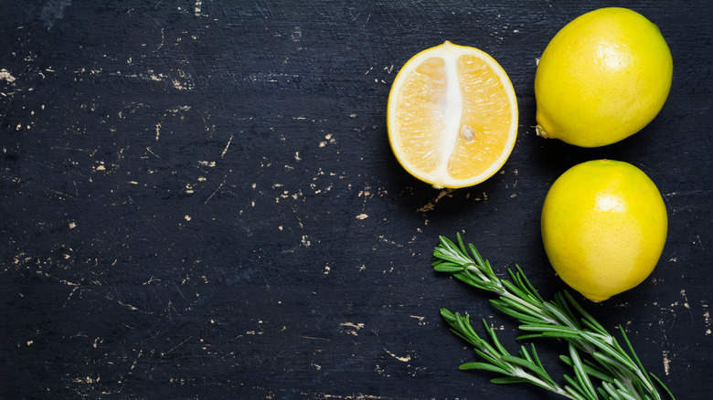 fresh organic lemons rosemary sprigs