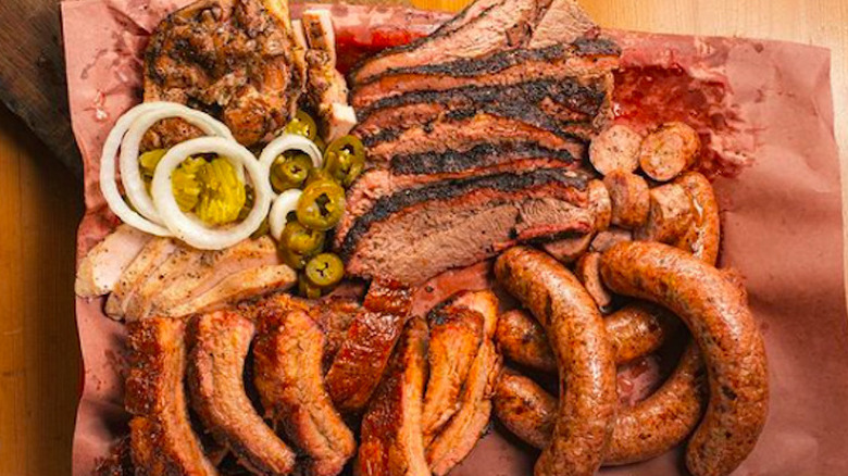 east texas style bbq plate with brisket sausage and ribs