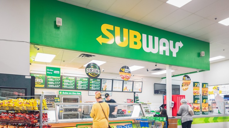 Subway store counter with customers