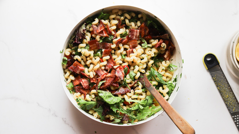 Bacon pieces added to salad