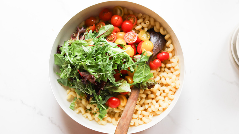 Salad ingredients together in bowl