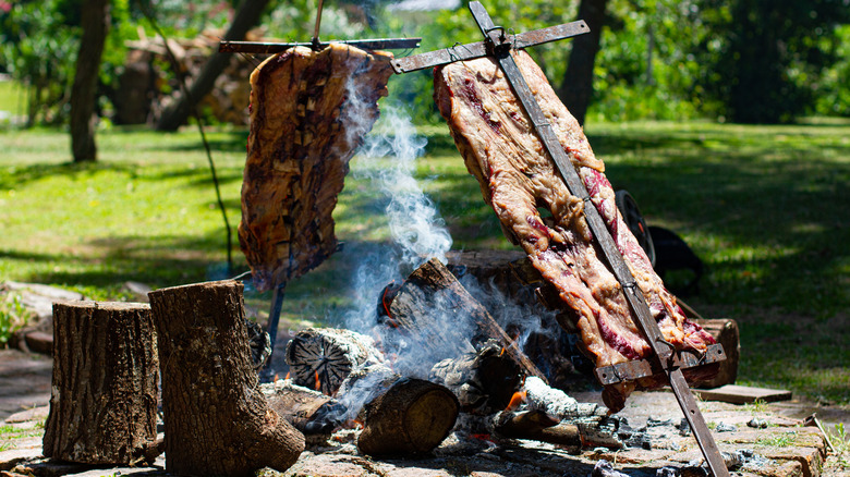 meat over burning wood