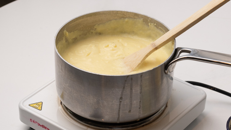 cooked polenta in saucepan