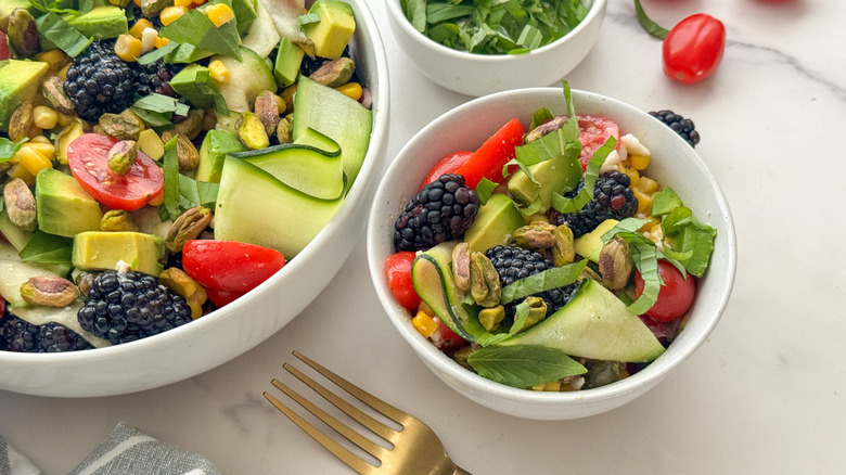 small and large bowl of salad