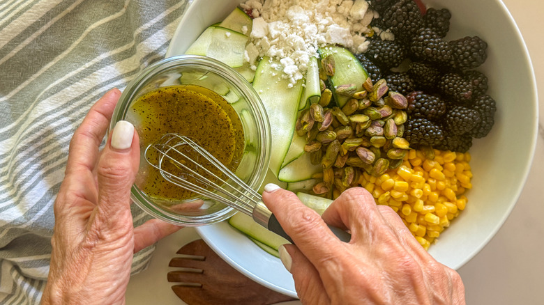 Add dressing to salad